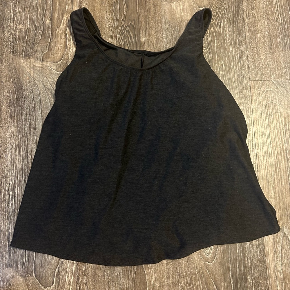 Black loose fitting tankini. Perfect for just a little extra coverage!